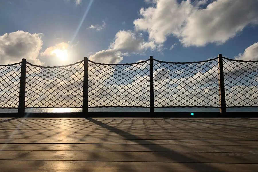 Nautical rope netting in use as decorative barrier