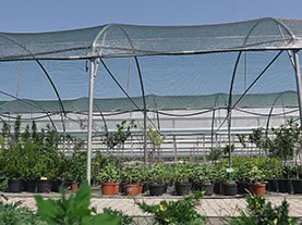 Shade cloth greenhouse application